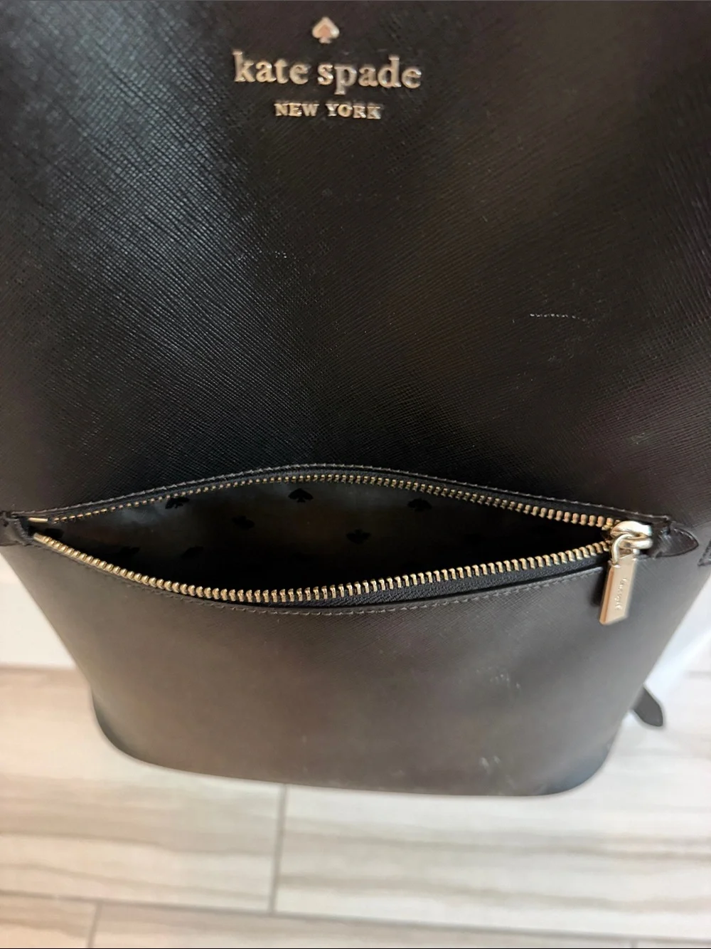 kate spade black saffiano leather backpack with silver-tone hardware